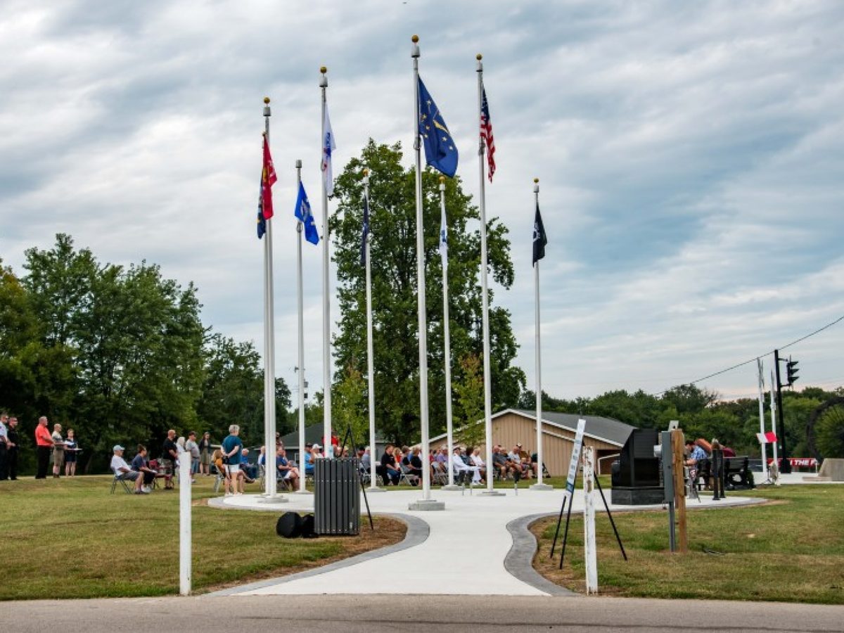 Flag ceremony at the Bicknell veterans memorial plaza