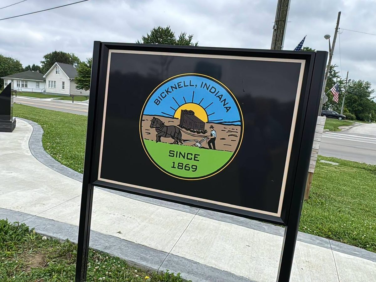 City seal sign at the memorial plaza in downtown Bicknell